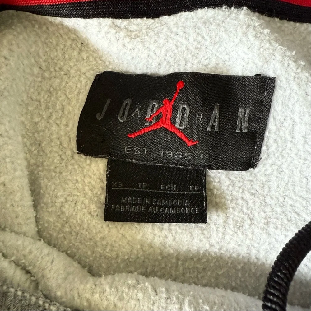 Gray Air Jordan Fleece Hoodie with Red and Black Details
